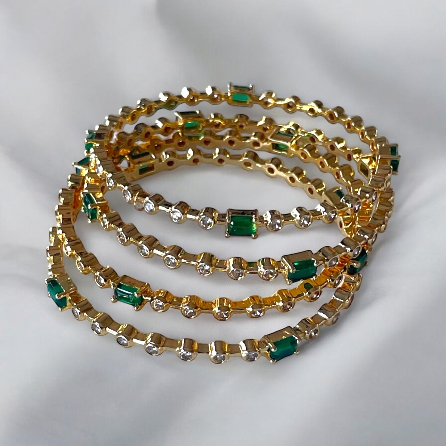 Elegant Set of 4 White Bangles with Green Stone Accents