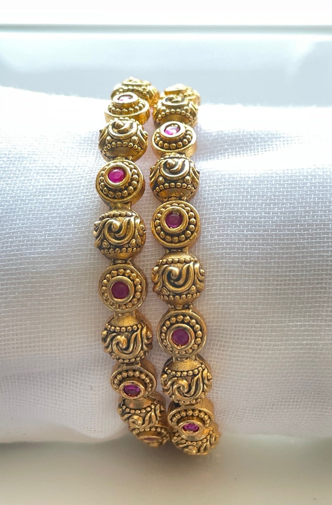 Elegant Gold Polished Kemp Stone Bangles ( Set of 2)