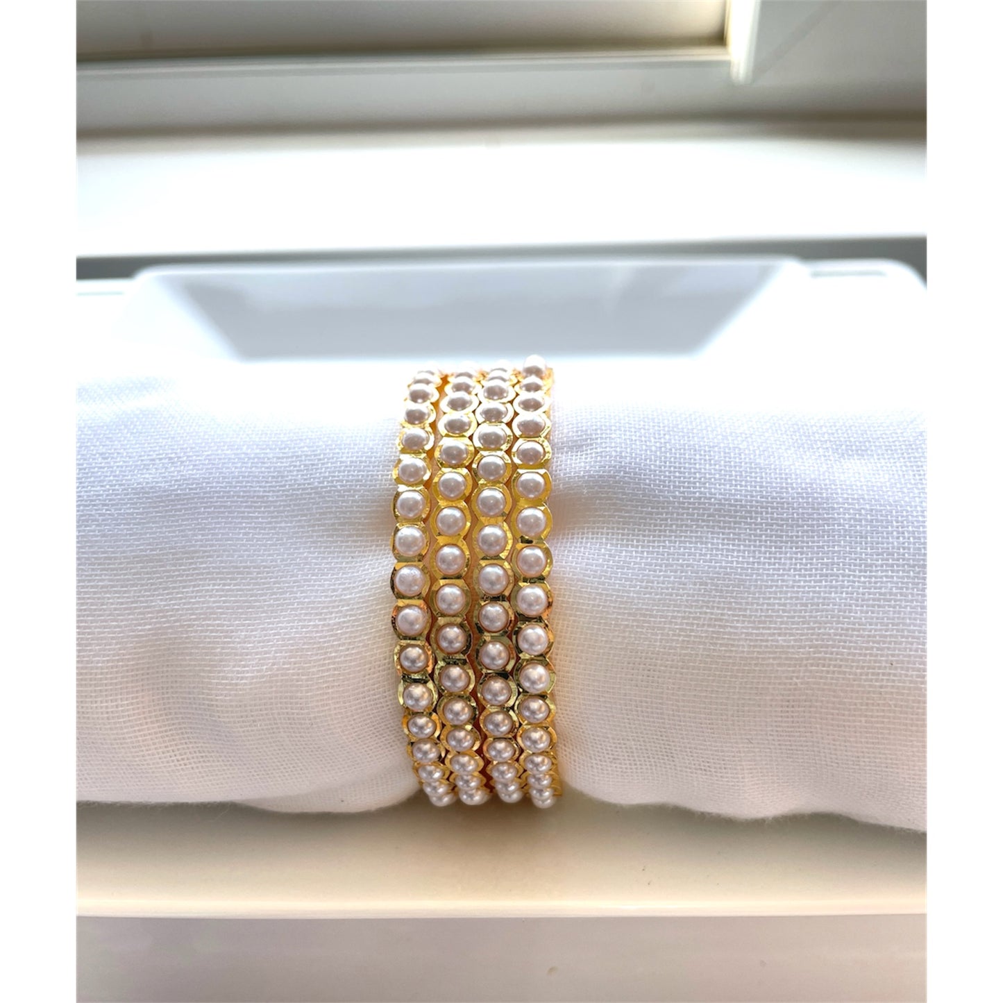 Gold Polished Pearl Bangles - Set of 4