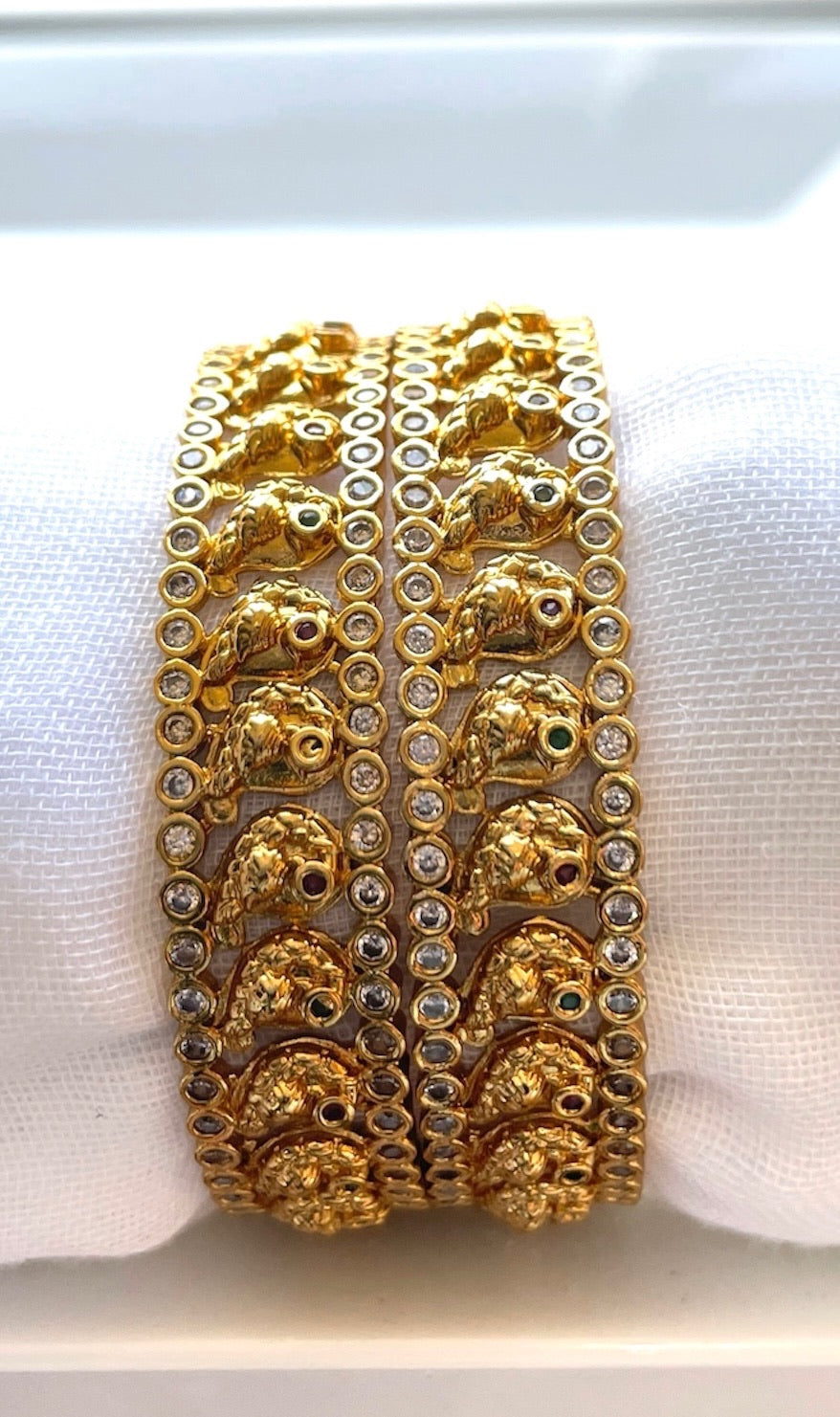 Gold Bangle with Sparkling White Stones and Bird Motif