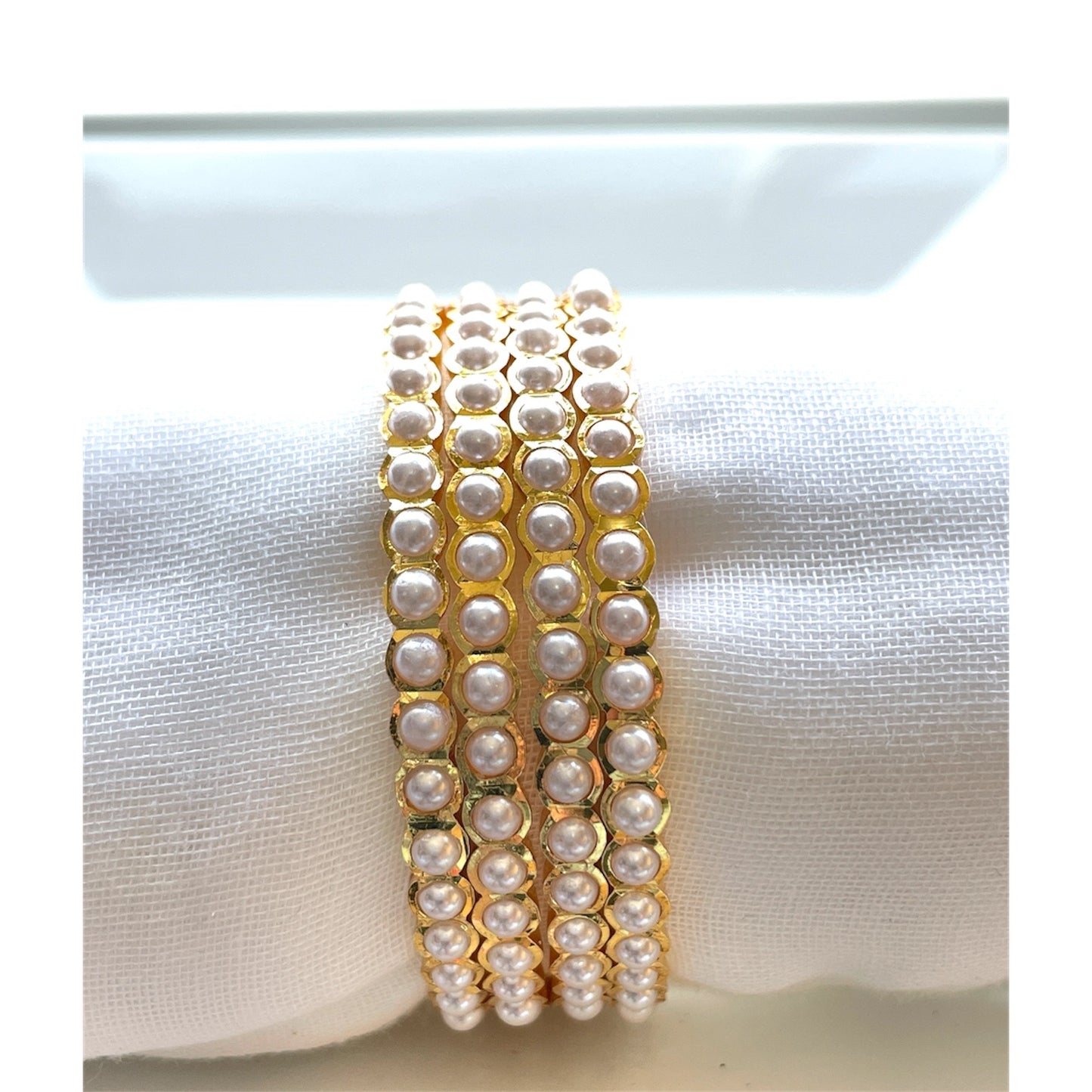 Gold Polished Pearl Bangles - Set of 4